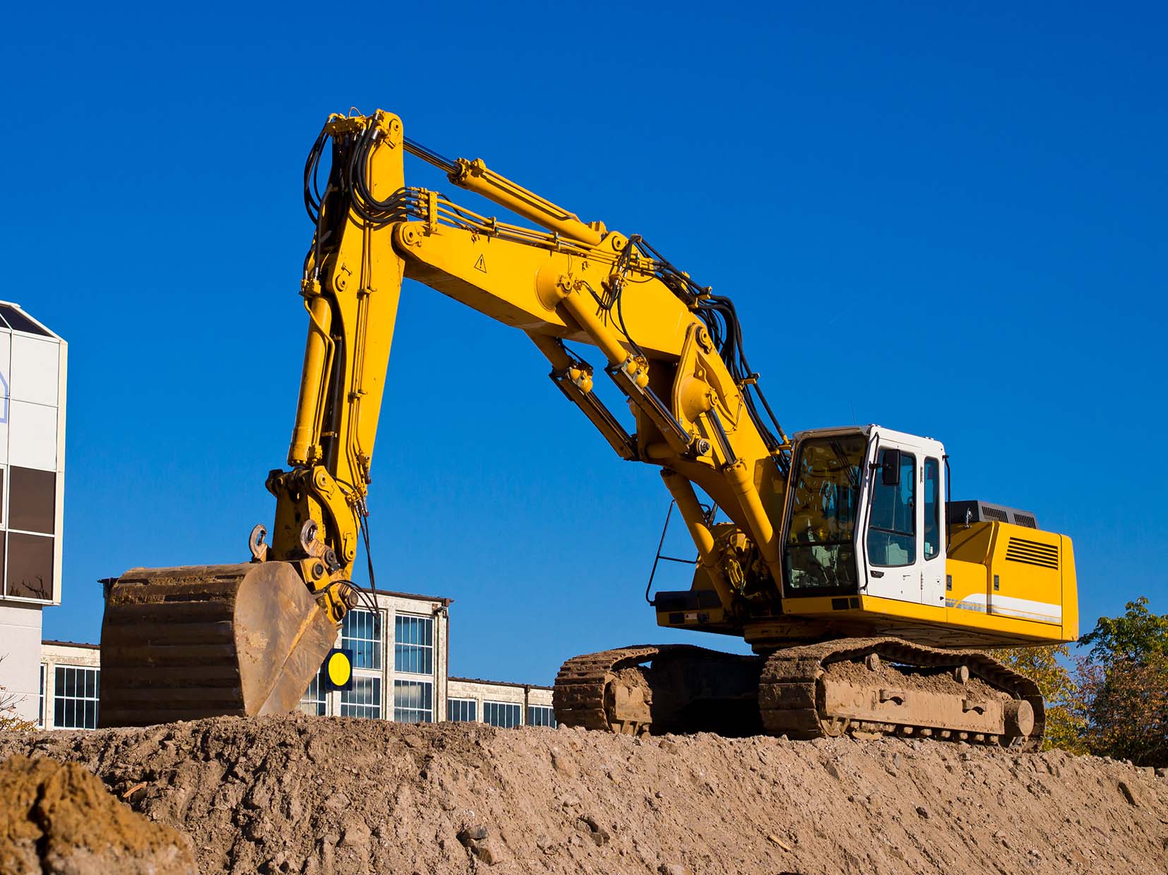 Excavator operator on site